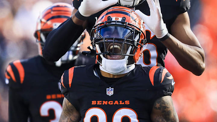 Dec 22, 2024; Cincinnati, Ohio, USA; Cincinnati Bengals running back Trayveon Williams (32) reacts after a play with safety Tycen Anderson (26) in the first half against the Cleveland Browns at Paycor Stadium. Mandatory Credit: Katie Stratman-Imagn Images