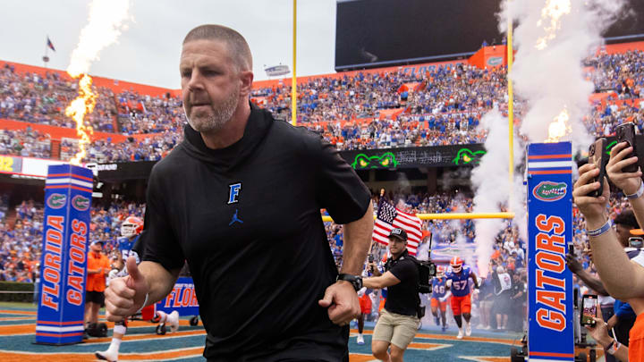 Florida Gators head coach Billy Napier runs onto the field before the start of the game at Ben Hill Griffin Stadium in Gainesville, FL on Saturday, September 7, 2024 against the Samford Bulldogs. The Gators won 45-7. [Doug Engle/Gainesville Sun]