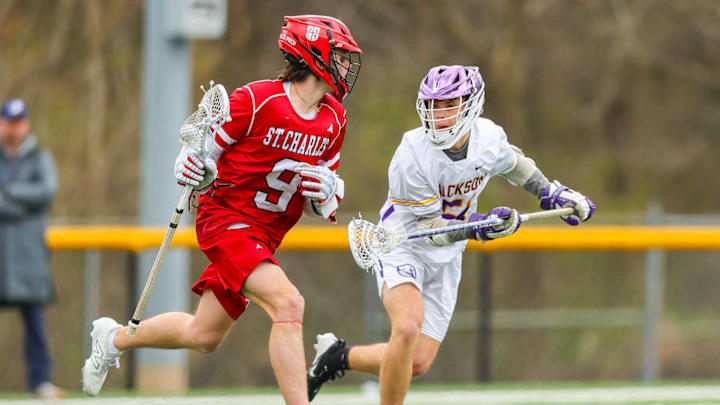 Trey Davis and the St. Charles Prep Cardinals, pictured here competing against Jackson in the 2025 season, broke into this week's Ohio high school boys lacrosse rankings.