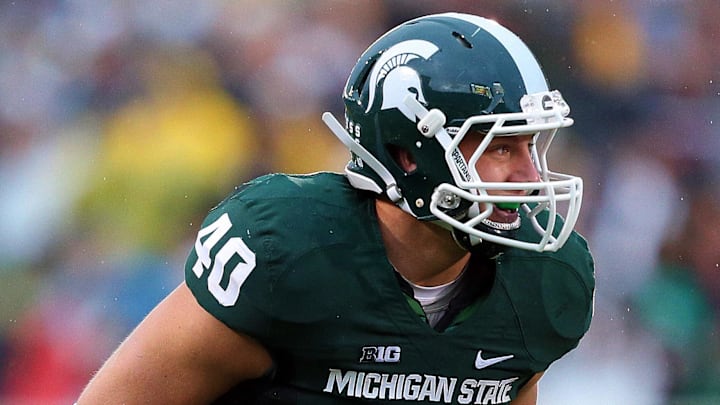 Nov 2, 2013; East Lansing, MI, USA; Michigan State Spartans linebacker Max Bullough (40) before the snap of the ball during the 2nd half of a game against the Michigan Wolverines at Spartan Stadium. MSU won 29-6. Mandatory Credit: Mike Carter-Imagn Images Nov 2, 2013; East Lansing, MI, USA; Michigan State Spartans linebacker Max Bullough (40) before the snap of the ball during the 2nd half of a game against the Michigan Wolverines at Spartan Stadium. MSU won 29-6. Mandatory Credit: Mike Carter-Imagn Images