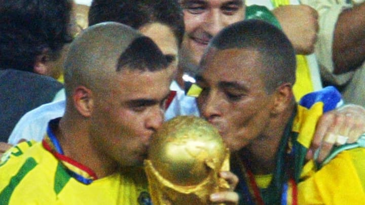 Brazil's forward Ronaldo (L) and midfielder Gilber