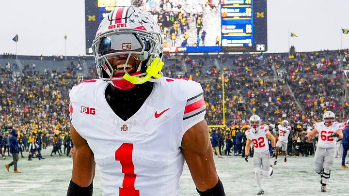 Ohio State Buckeyes cornerback Davison Igbinosun celebrates after defeating the Michigan Wolverines. Ohio State Buckeyes cornerback Davison Igbinosun celebrates after defeating the Michigan Wolverines.