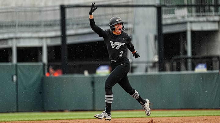 Cori McMillan celebrates mid homerun trot. Cori McMillan celebrates mid homerun trot.