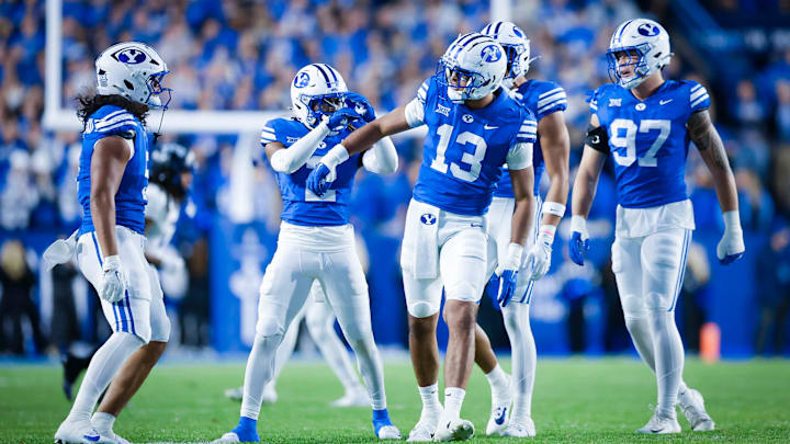 BYU defensive end Tausili Akana celebrates a tackle for loss against TCU