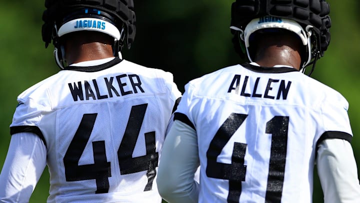 Jacksonville Jaguars outside linebacker Travon Walker (44) and defensive end/outside linebacker Josh