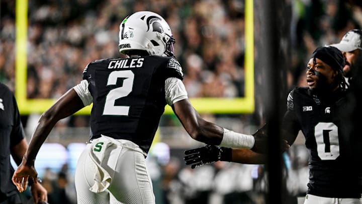 Michigan State's Aidan Chiles, left, celebrates his touchdown pass with Alante Brown during the second quarter in the game against Boston College on Saturday, Sept. 6, 2025, at Spartan Stadium in East Lansing.