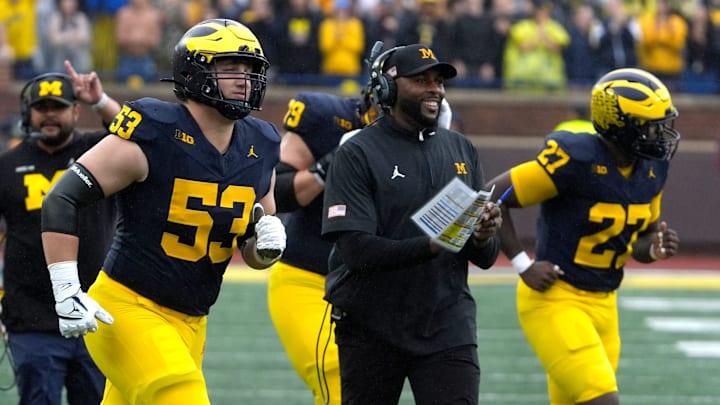 Michigan football coach Sherrone Moore celebrates a play during first-half action between Michigan and Minnesota at Michigan Stadium in Ann Arbor on Saturday, Sept. 28, 2024.