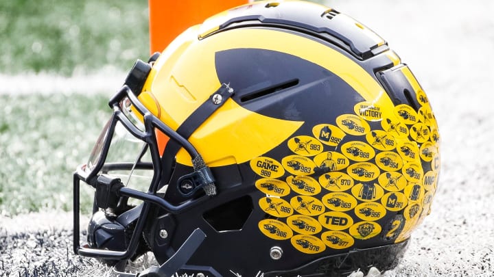 Michigan running back Blake Corum's helmet sits on the turf during warmups before the Ohio State game at Michigan Stadium in Ann Arbor on Saturday, Nov. 25, 2023. Michigan running back Blake Corum's helmet sits on the turf during warmups before the Ohio State game at Michigan Stadium in Ann Arbor on Saturday, Nov. 25, 2023.