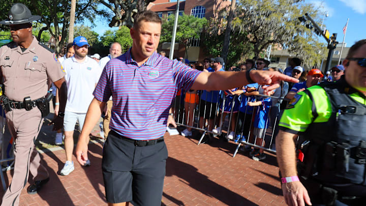 Florida Head Coach Jon Sumrall greats fans as he heads to the locker room during Gator Walk before the Orange and Blue game at Steve Spurrier Field at Ben Hill Griffin Stadium in Gainesville, FL on Saturday, April 11, 2026. [Alan Youngblood/Gainesville Sun]