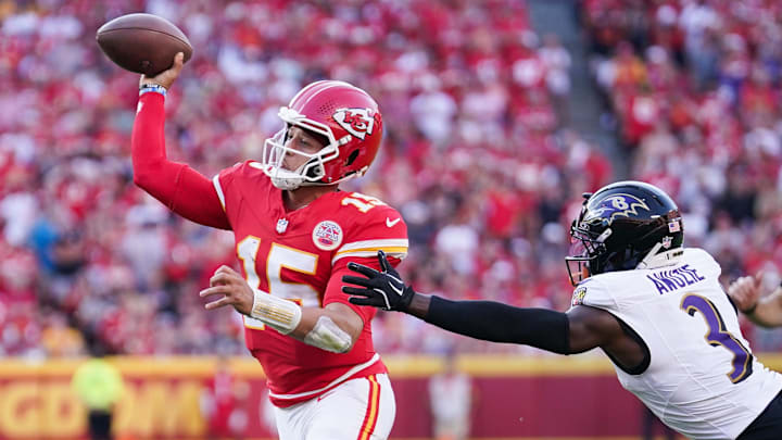 Sep 28, 2025; Kansas City, Missouri, USA; Kansas City Chiefs quarterback Patrick Mahomes (15) makes a pass as Baltimore Ravens cornerback Chidobe Awuzie (3) defends at GEHA Field at Arrowhead Stadium. Mandatory Credit: Denny Medley-Imagn Images