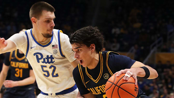 Jan 1, 2025; Pittsburgh, Pennsylvania, USA;  California Golden Bears guard Andrej Stojakovic (2) drives to the basket against Pittsburgh Panthers guard Amsal Delalic (52) during the first half at the Petersen Events Center. Mandatory Credit: Charles LeClaire-Imagn Images