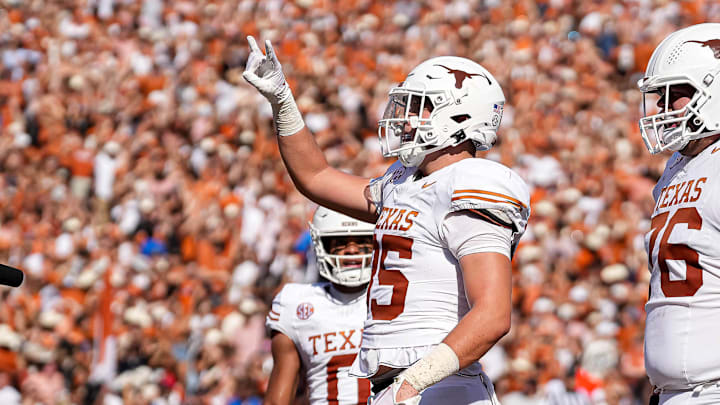 Texas Longhorns tight end Gunnar Helm (85) celebrates a touchdown during the Red River Rivalry game against Oklahoma at the Cotton Bowl on Saturday, Oct. 12, 2024 in Dallas, Texas.