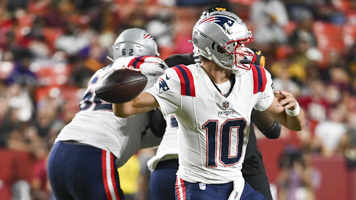 Aug 25, 2024; Landover, Maryland, USA; New England Patriots quarterback Drake Maye (10) throws  during the first half against the Washington Commanders at Commanders Field.