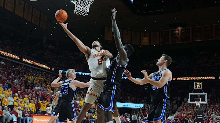 Iowa State Cyclones forward Joshua Jefferson (2) goes for a layup around BYU Cougars's center Keba Keita (13) during the second half of the Big-12 men’s basketball in the Senior Day at Hilton Coliseum on March 4, 2025, in Ames, Iowa. Iowa State Cyclones forward Joshua Jefferson (2) goes for a layup around BYU Cougars's center Keba Keita (13) during the second half of the Big-12 men’s basketball in the Senior Day at Hilton Coliseum on March 4, 2025, in Ames, Iowa.