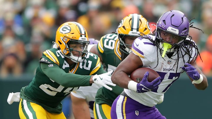 Green Bay Packers cornerback Carrington Valentine (24) and linebacker Ty'Ron Hopper (59) tackle Minnesota Vikings running back Jordan Mason (27) on Sunday, November 23, 2025, at Lambeau Field in Green Bay, Wis. The Packers defeated the Vikings 23-6.
Wm. Glasheen USA TODAY NETWORK-Wisconsin