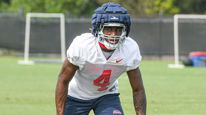 Suntarine Perkins (4) runs through a drill during Ole Miss football practice in Oxford, Miss., on Friday, Aug. 11, 2023.
