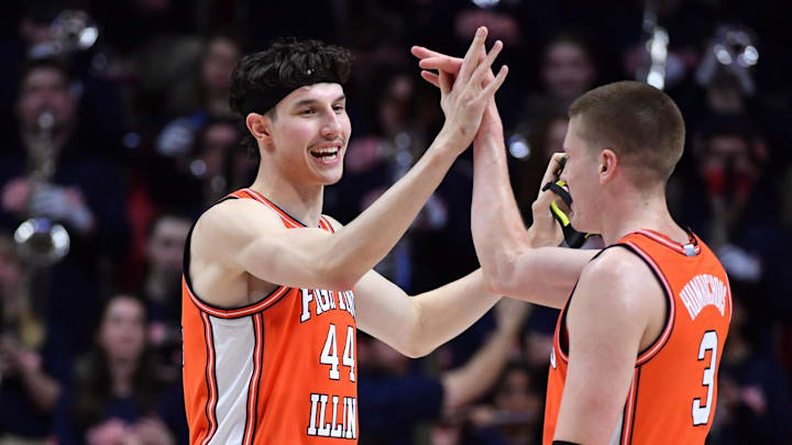 Jan 29, 2026; Champaign, Illinois, USA; Illinois Fighting Illini forward Zvonimir Ivisic (44) and teammate Ben Humrichhous (3) celebrate a win against the Washington Huskies at State Farm Center. Mandatory Credit: Ron Johnson-Imagn Images Jan 29, 2026; Champaign, Illinois, USA; Illinois Fighting Illini forward Zvonimir Ivisic (44) and teammate Ben Humrichhous (3) celebrate a win against the Washington Huskies at State Farm Center. Mandatory Credit: Ron Johnson-Imagn Images
