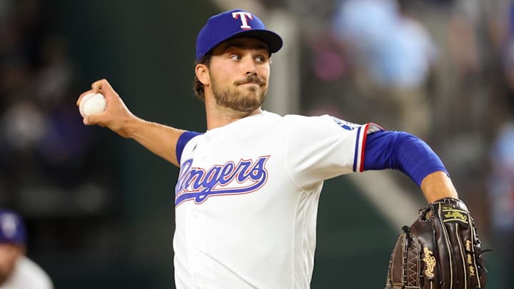 Texas Rangers pitcher Carter Baumler throws a baseball. 