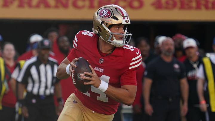 Aug 13, 2026; Santa Clara, California, USA;  San Francisco 49ers quarterback Kurtis Rourke (14) rolls out to pass against the Tennessee Titans in the first quarter at Levi's Stadium. Mandatory Credit: David Gonzales-Imagn Images