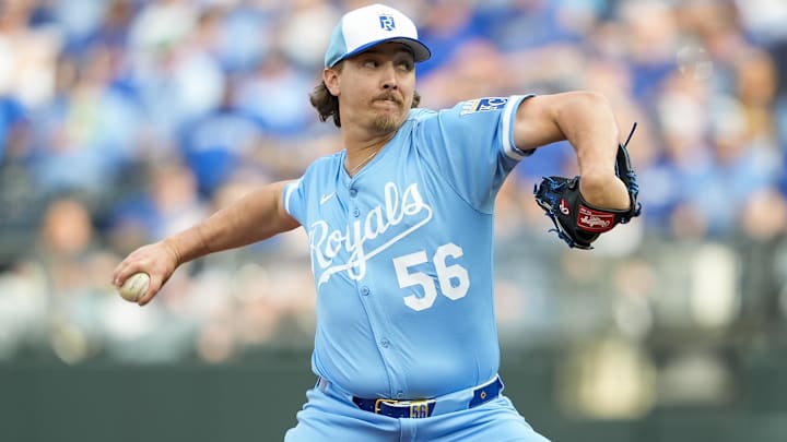 Mar 27, 2025; Kansas City, Missouri, USA; Kansas City Royals relief pitcher Hunter Harvey (56) pitches during the eighth inning against the Cleveland Guardians at Kauffman Stadium.