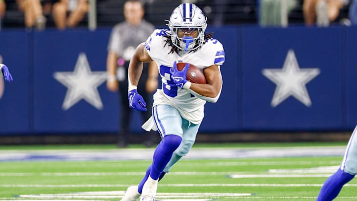 Dallas Cowboys running back Jaydon Blue carries the ball during the fourth quarter against the Atlanta Falcons.