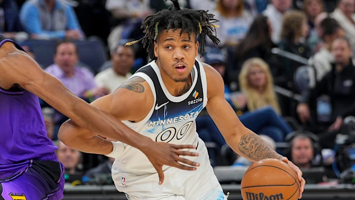 Dec 2, 2024; Minneapolis, Minnesota, USA; Minnesota Timberwolves guard Terrence Shannon Jr. (00) dribbles against the Los Angeles Lakers in the fourth quarter at Target Center. Mandatory Credit: Brad Rempel-Imagn Images Dec 2, 2024; Minneapolis, Minnesota, USA; Minnesota Timberwolves guard Terrence Shannon Jr. (00) dribbles against the Los Angeles Lakers in the fourth quarter at Target Center. Mandatory Credit: Brad Rempel-Imagn Images