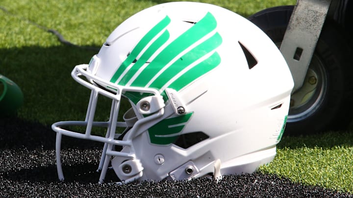 Sep 14, 2024; Lubbock, Texas, USA;  A North Texas Mean Green helmet on the turf in the first half during the game against the Texas Tech Red Raiders at Jones AT&T Stadium and Cody Campbell Field. Mandatory Credit: Michael C. Johnson-Imagn Images