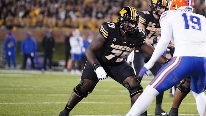 Nov 18, 2023; Columbia, Missouri, USA; Missouri Tigers offensive lineman Armand Membou (79) at the line of scrimmage against the Florida Gators during the game at Faurot Field at Memorial Stadium. Mandatory Credit: Denny Medley-Imagn Images