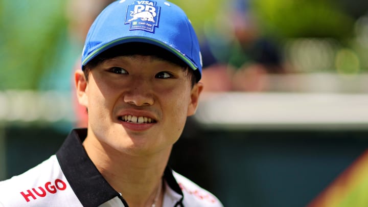 May 5, 2024; Miami Gardens, Florida, USA; RB racing driver Yuki Tsunoda (22) walks into the F1 Village before the F1 Miami Grand Prix at Miami International Autodrome. Mandatory Credit: Peter Casey-USA TODAY Sports