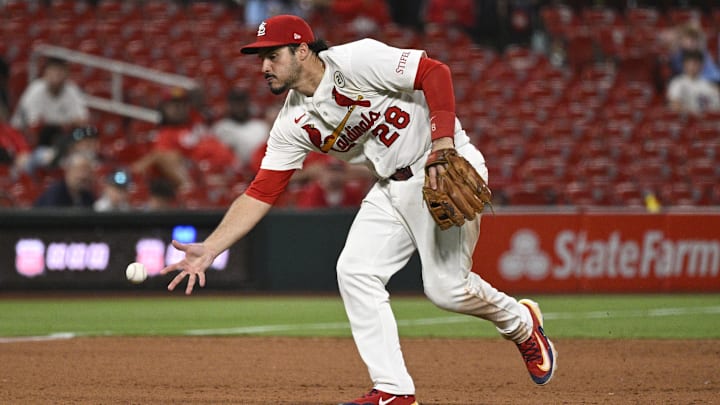 Sep 15, 2025; St. Louis, Missouri, USA; St. Louis Cardinals third baseman Nolan Arenado (28) fields a ground ball hit by Cincinnati Reds third baseman Santiago Espinal (not pictured) in the ninth inning at Busch Stadium. Mandatory Credit: Joe Puetz-Imagn Images Sep 15, 2025; St. Louis, Missouri, USA; St. Louis Cardinals third baseman Nolan Arenado (28) fields a ground ball hit by Cincinnati Reds third baseman Santiago Espinal (not pictured) in the ninth inning at Busch Stadium. Mandatory Credit: Joe Puetz-Imagn Images