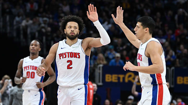 Nov 10, 2024; Detroit, Michigan, USA;  Detroit Pistons guard Cade Cunningham (2) celebrates with forward Simone Fontecchio (19) after making a three-point shot against the Houston Rockets in the second quarter at Little Caesars Arena. Mandatory Credit: Lon Horwedel-Imagn Images