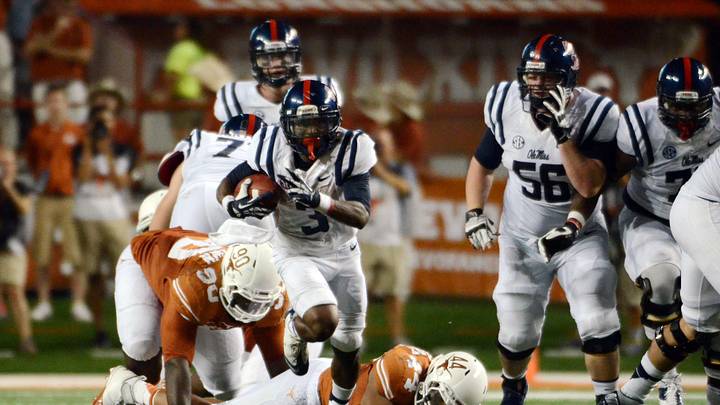 Sep 14, 2013; Austin, TX, USA; Mississippi Rebels running back Jeff Scott (3) carries the ball against the Texas Longhorns during the second half at Darrell K Royal-Texas Memorial Stadium. Ole Miss beat Texas 44-23. Mandatory Credit: Brendan Maloney-Imagn Images Sep 14, 2013; Austin, TX, USA; Mississippi Rebels running back Jeff Scott (3) carries the ball against the Texas Longhorns during the second half at Darrell K Royal-Texas Memorial Stadium. Ole Miss beat Texas 44-23. Mandatory Credit: Brendan Maloney-Imagn Images