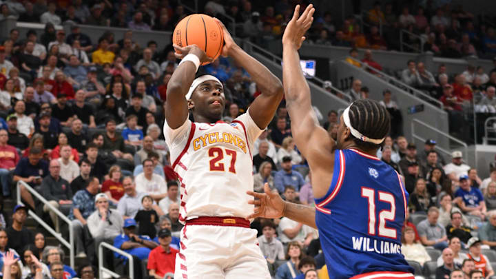 Mar 20, 2026; St. Louis, MO, USA; Iowa State Cyclones guard Killyan Toure (27) shoots the ball against Tennessee State Tigers forward Carlous Williams (12) during the first half of a first round game of the men's 2026 NCAA Tournament at Enterprise Center. Mar 20, 2026; St. Louis, MO, USA; Iowa State Cyclones guard Killyan Toure (27) shoots the ball against Tennessee State Tigers forward Carlous Williams (12) during the first half of a first round game of the men's 2026 NCAA Tournament at Enterprise Center.
