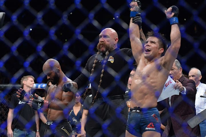 Henry Cejudo is declared the winner by decision and is the new Flyweight champion against Demetrious Johnson during UFC 227.