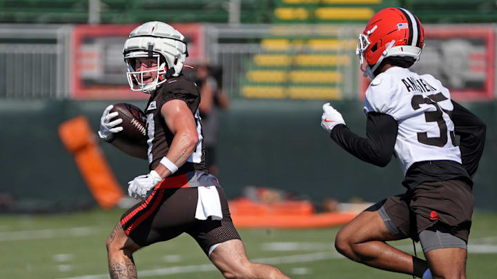 Cleveland Browns wide receiver Luke Floriea, left, gets away from cornerback Chigozie Anusiem (35) during a training camp practice July 23, 2025, in Berea.