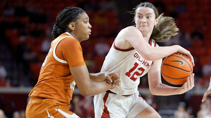 Oklahoma Sooners guard Payton Verhulst passes as Texas Longhorns forward Madison Booker defends during OU's 71-70 win over the Longhorns last year.