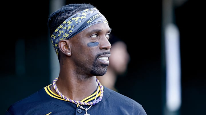 Jun 19, 2025; Detroit, Michigan, USA;  Pittsburgh Pirates designated hitter Andrew McCutchen (22) in the dugout in the sixth inning against the Detroit Tigers at Comerica Park. Mandatory Credit: Rick Osentoski-Imagn Images