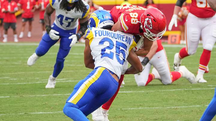 Aug 15, 2026; Kansas City, Missouri, USA; Los Angeles Rams wide receiver Jordan Whittington (88) runs the ball as Los Angeles Rams cornerback Nyzier Fourqurean (25) makes the tackle during the second half of the pre season game at Arrowhead Stadium. Mandatory Credit: Denny Medley-Imagn Images