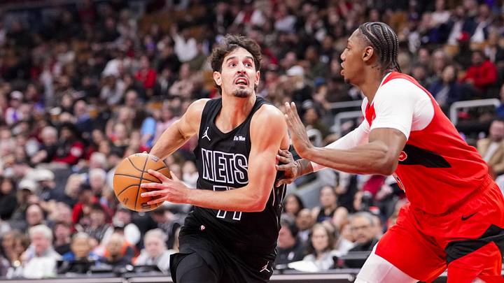 Apr 12, 2026; Toronto, Ontario, CAN; Brooklyn Nets Ben Saraf (77) drives to the basket against Toronto Raptors RJ Barrett (9) during the first half at Scotiabank Arena. Mandatory Credit: Kevin Sousa-Imagn Images Apr 12, 2026; Toronto, Ontario, CAN; Brooklyn Nets Ben Saraf (77) drives to the basket against Toronto Raptors RJ Barrett (9) during the first half at Scotiabank Arena. Mandatory Credit: Kevin Sousa-Imagn Images