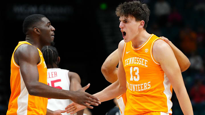 Nov 25, 2025; Las Vegas, NV, USA; Tennessee Volunteers forward J.P. Estrella (13) and forward Dewayne Brown II (6) react in a 2025 Players Era Festival group play game against the Houston Cougars during the second half at MGM Grand Garden Arena. Mandatory Credit: Stephen R. Sylvanie-Imagn Images Nov 25, 2025; Las Vegas, NV, USA; Tennessee Volunteers forward J.P. Estrella (13) and forward Dewayne Brown II (6) react in a 2025 Players Era Festival group play game against the Houston Cougars during the second half at MGM Grand Garden Arena. Mandatory Credit: Stephen R. Sylvanie-Imagn Images