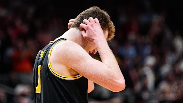 Michigan center Danny Wolf (1) reacts after losing the ball out of bound against Auburn during the second half of the Sweet 16 round of NCAA tournament at State Farm Arena in Atlanta, Ga. on Friday, March 28, 2025. Michigan center Danny Wolf (1) reacts after losing the ball out of bound against Auburn during the second half of the Sweet 16 round of NCAA tournament at State Farm Arena in Atlanta, Ga. on Friday, March 28, 2025.