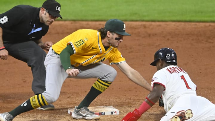 Jul 19, 2025: Cleveland Guardians center fielder Angel Martinez (1) is tagged out by Athletics shortstop Jacob Wilson (5) while attempting to steal second base in the fifth inning at Progressive Field. 