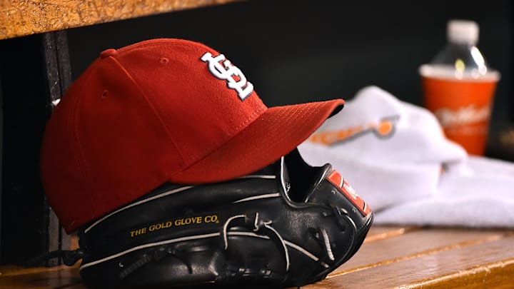 Aug 15, 2015; St. Louis, MO, USA; A detailed view of a baseball glove and St. Louis Cardinals hat in the dugout during the game between the Cardinals and the Miami Marlins at Busch Stadium. Mandatory Credit: Jasen Vinlove-Imagn Images Aug 15, 2015; St. Louis, MO, USA; A detailed view of a baseball glove and St. Louis Cardinals hat in the dugout during the game between the Cardinals and the Miami Marlins at Busch Stadium. Mandatory Credit: Jasen Vinlove-Imagn Images