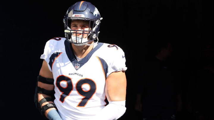 Oct 1, 2023; Chicago, Illinois, USA; Denver Broncos defensive end Zach Allen (99) takes the field before the game against the Chicago Bears at Soldier Field. Mandatory Credit: Mike Dinovo-USA TODAY Sports