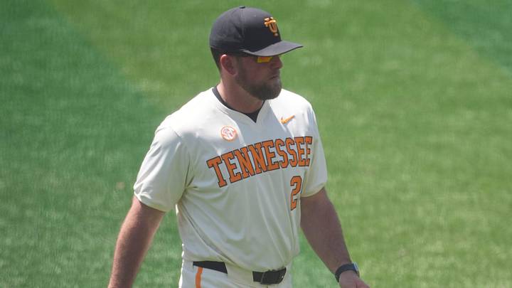 Tennessee baseball coach Josh Elander returns to the dugout after taking out pitcher Taylor Tracey (29) in an NCAA college baseball game against and Texas on May 10, 2026, in Knoxville, Tennessee.