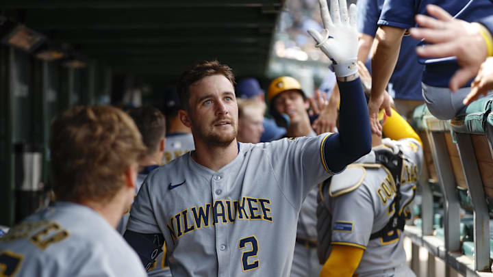 Aug 21, 2025; Chicago, Illinois, USA; Milwaukee Brewers second baseman Brice Turang (2) celebrates with teammates in the dugout after hitting a two-run home run against the Chicago Cubs during the second inning at Wrigley Field. Mandatory Credit: Kamil Krzaczynski-Imagn Images Aug 21, 2025; Chicago, Illinois, USA; Milwaukee Brewers second baseman Brice Turang (2) celebrates with teammates in the dugout after hitting a two-run home run against the Chicago Cubs during the second inning at Wrigley Field. Mandatory Credit: Kamil Krzaczynski-Imagn Images