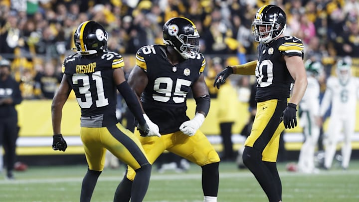 Oct 20, 2024; Pittsburgh, Pennsylvania, USA;  Pittsburgh Steelers cornerback Beanie Bishop Jr. (31) and defensive tackle Keeanu Benton (95) and linebacker T.J. Watt (90) celebrate a defensive stop against the New York Jets during the fourth quarter at Acrisure Stadium. Mandatory Credit: Charles LeClaire-Imagn Images