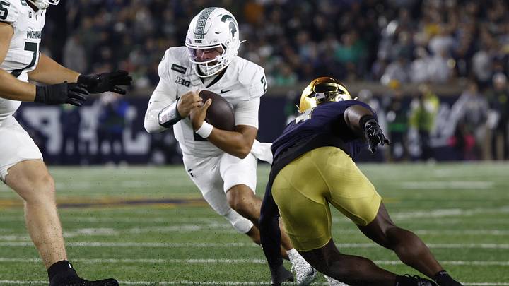 Sep 19, 2026; South Bend, Indiana, USA; Michigan State Spartans quarterback Cam Fancher (2) runs against Notre Dame Fighting Irish linebacker Jaylen Sneed (3) during the first half at Notre Dame Stadium. Mandatory Credit: Michael Caterina-Imagn Images Sep 19, 2026; South Bend, Indiana, USA; Michigan State Spartans quarterback Cam Fancher (2) runs against Notre Dame Fighting Irish linebacker Jaylen Sneed (3) during the first half at Notre Dame Stadium. Mandatory Credit: Michael Caterina-Imagn Images