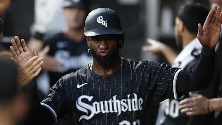 Chicago, Illinois, USA; Chicago White Sox outfielder Luis Robert Jr. (88) celebrates with teammates after scoring against the Detroit Tigers during the first inning  at Guaranteed Rate Field.