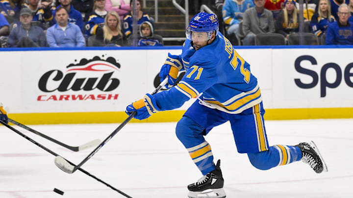 Oct 19, 2024; St. Louis, Missouri, USA;  St. Louis Blues right wing Mathieu Joseph (71) shoots and scores against the Carolina Hurricanes during the second period at Enterprise Center. Mandatory Credit: Jeff Curry-Imagn Images
